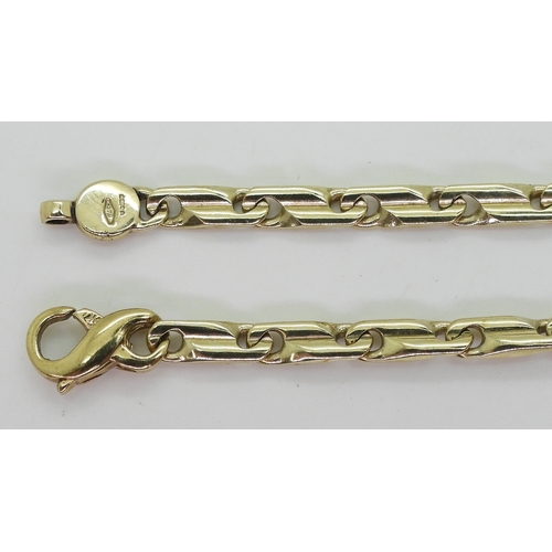 2821 - A 9CT GOLD FANCY CHAINof twisted baton links, length 44.5cm, weight 24.9gms