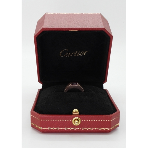 2829 - A CARTIER GARNET RINGmade in 18ct rose gold, fully signed Cartier 52 2001, with the serial number N4... 