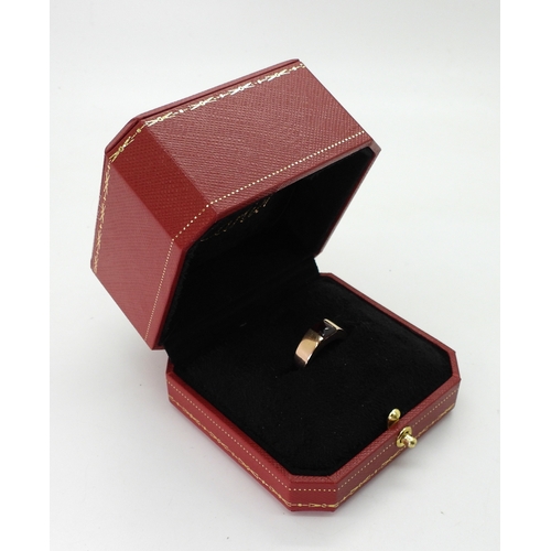 2829 - A CARTIER GARNET RINGmade in 18ct rose gold, fully signed Cartier 52 2001, with the serial number N4... 