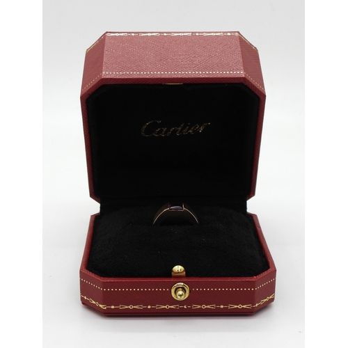 2829 - A CARTIER GARNET RINGmade in 18ct rose gold, fully signed Cartier 52 2001, with the serial number N4... 