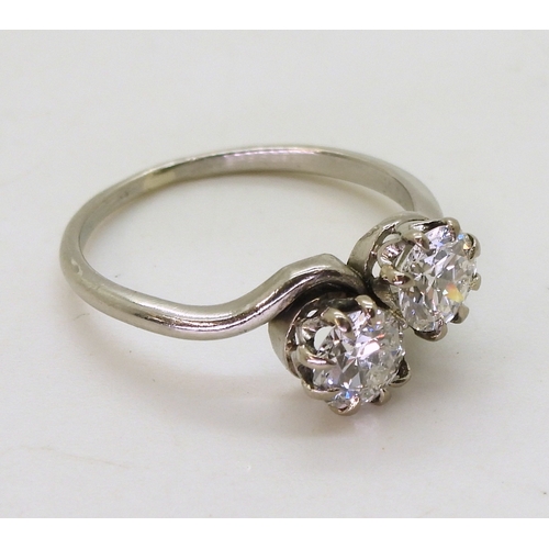 2837 - A CLASSIC TWIN STONE ON A TWISTset with estimated approx 1ct in total across the two diamonds, set i... 