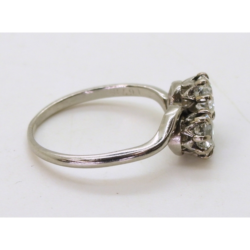 2837 - A CLASSIC TWIN STONE ON A TWISTset with estimated approx 1ct in total across the two diamonds, set i... 