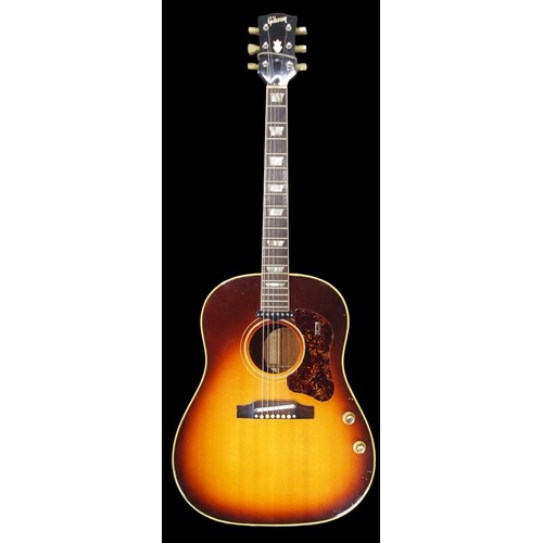 GIBSON a Gibson J160E electro acoustic guitar in dark sunburst serial number 890922 circa 1969 with original fitted case