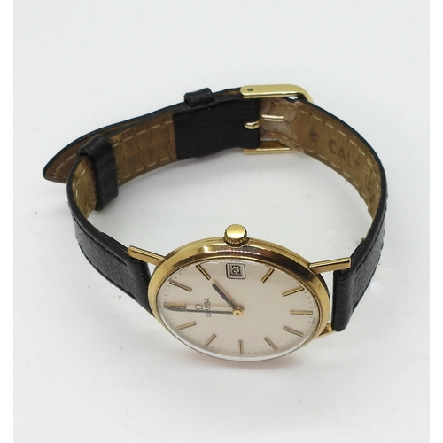 2921 - A 9CT GOLD GENTS OMEGA WATCHwith silvered dial, gold and black baton numerals and hands, with date a... 