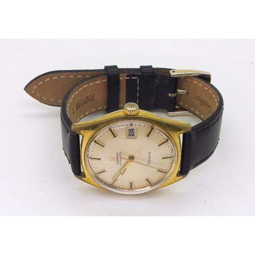 2930 - AN OMEGA AUTOMATIC GENEVEwith a gold plated case, date aperture cream dial with black & gold col... 