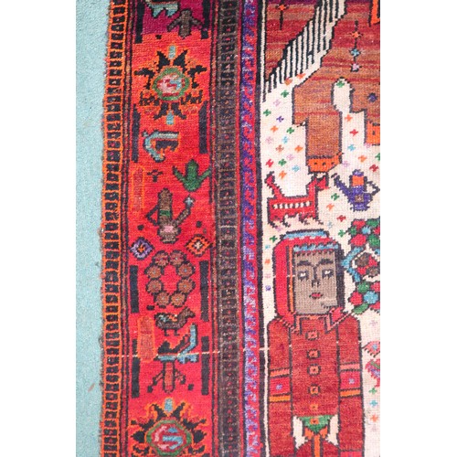 2138 - A BEIGE GROUND IRANIAN LORI RUNNERcentral panel decorated with geometric figure on horseback over pa... 