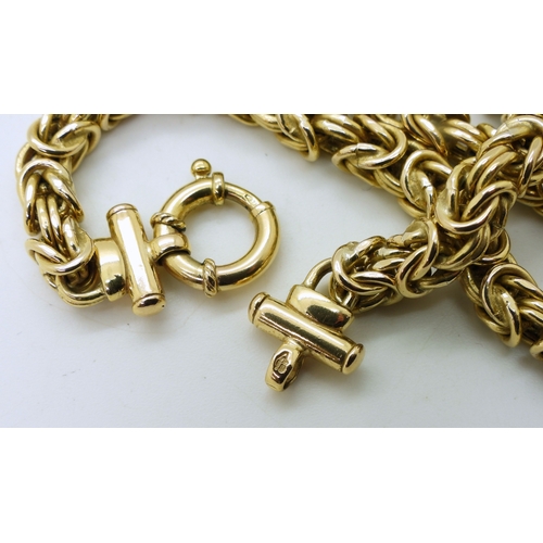 2838 - AN ITALIAN FANCY KNOT CHAINmade in 9ct gold, with large decorative bolt ring closure, thickness of t... 