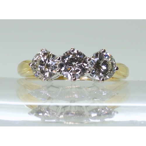 2839 - A THREE STONE DIAMOND RINGset with estimated approx 1.50cts of brilliant cut diamonds, in a classic ... 