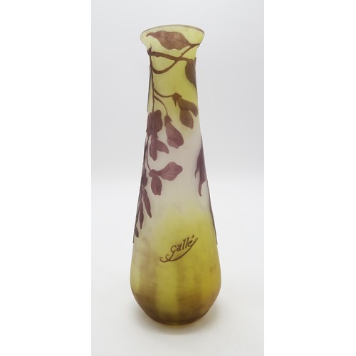 2271 - EMILE GALLE (1846-1904) A large cameo glass vase decorated with wisteria, with purple over yellow an... 