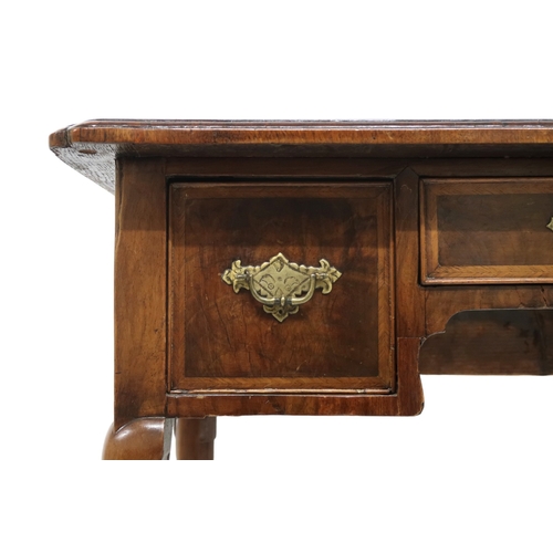 2048 - A 19TH CENTURY MAHOGANY LOWBOYwith shaped crossbanded veneered top over shallow central drawer flank... 