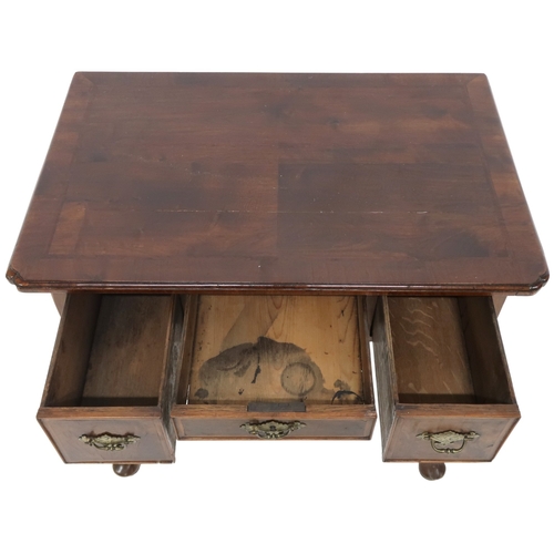 2048 - A 19TH CENTURY MAHOGANY LOWBOYwith shaped crossbanded veneered top over shallow central drawer flank... 