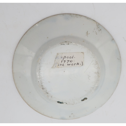 238 - A possible Liverpool enamel plate decorated with a church and buildings, an 18th century Derby tea f... 