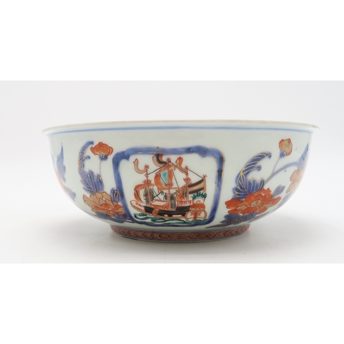 2393 - AN IMARI 'BLACK SHIP' BOWLdecorated with ships and figures on a diaper pattern ground, 25.5cm diamet... 