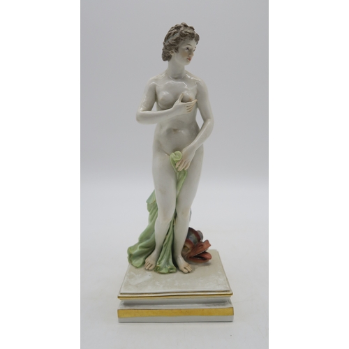 2273 - A MEISSEN FIGURE OF VENUSmodelled standing beside a grotesque dolphin, 25cm high... 