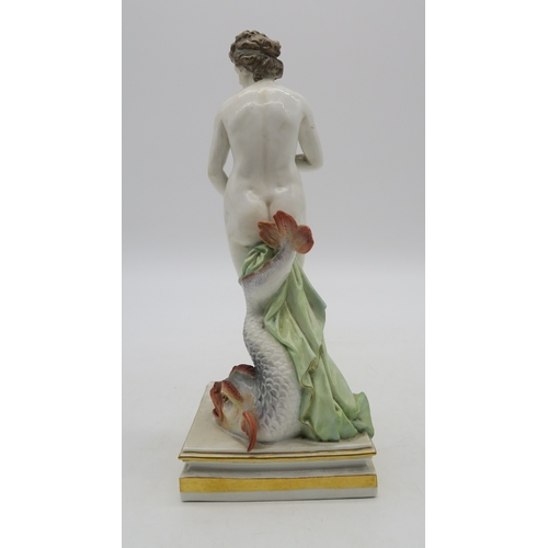 2273 - A MEISSEN FIGURE OF VENUSmodelled standing beside a grotesque dolphin, 25cm high... 