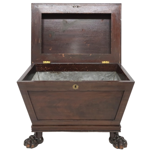 2059 - A 19TH CENTURY MAHOGANY SARCOPHAGUS CELLARETTE with hinged lid concealing fitted lead internal ... 