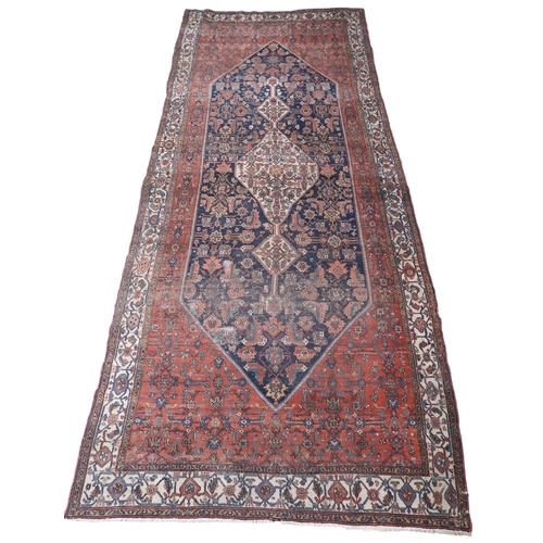 2139 - A LARGE BLUE GROUND HAMADAN CARPET with cream diamond central medallion on geometric floral pat... 