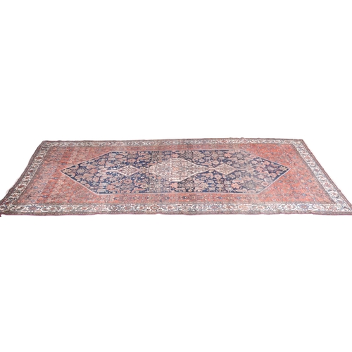 2139 - A LARGE BLUE GROUND HAMADAN CARPET with cream diamond central medallion on geometric floral pat... 