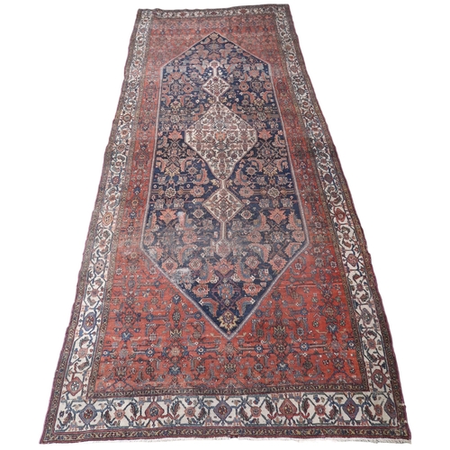 2139 - A LARGE BLUE GROUND HAMADAN CARPET with cream diamond central medallion on geometric floral pat... 