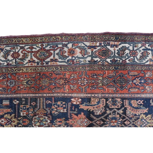 2139 - A LARGE BLUE GROUND HAMADAN CARPET with cream diamond central medallion on geometric floral pat... 