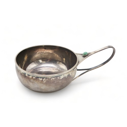 2515 - CHARLES ROBERT ASHBEE;a silver porringer, with Guild of Handicraft marks, London 1906, inset with an... 