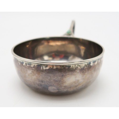 2515 - CHARLES ROBERT ASHBEE;a silver porringer, with Guild of Handicraft marks, London 1906, inset with an... 