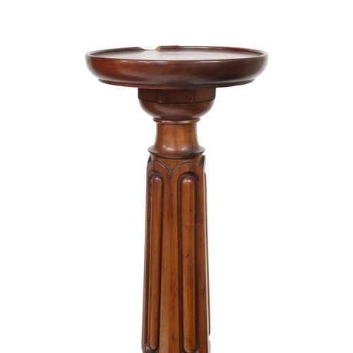 14 - A 20th century mahogany circular topped torchiere carved column on square stepped base, 139cm high x... 