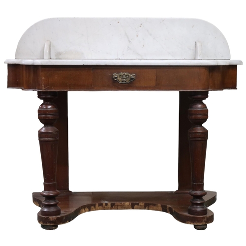 A Victorian mahogany marble topped wash stand with shaped marble top and backsplash over single frieze drawer on turned supports joined by shaped lower tiered base, 88cm high x 105cm wide x 48cm deep