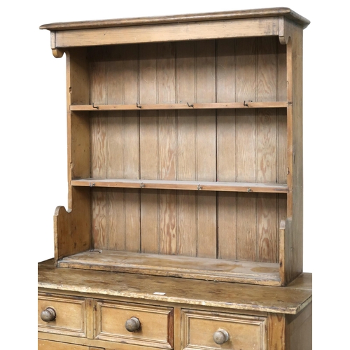 26 - A lot comprising a Victorian pine kitchen cabinet with one long and on short drawers over pair of pa... 