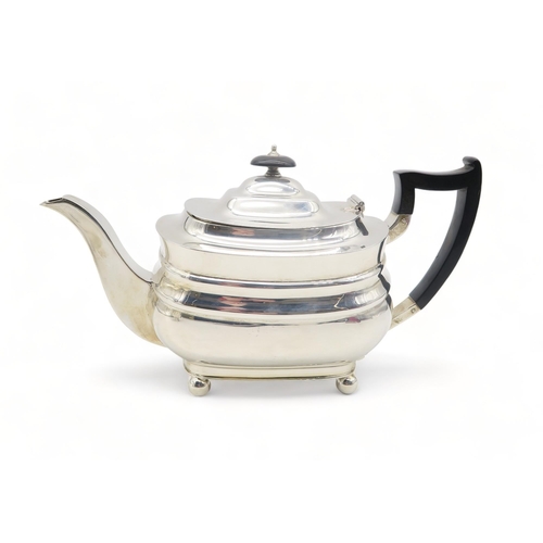 366 - A George V silver tea pot, by William Hutton & Sons, Sheffield 1936, of squat rectangular form, ... 