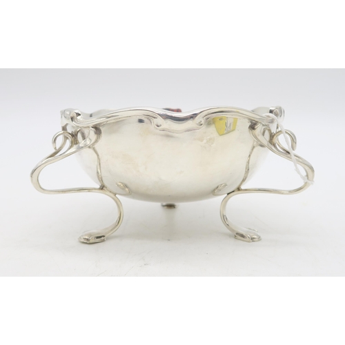 370 - An Art Nouveau silver bowl, by Elkington & Co, Birmingham 1907, on three stylised pad feet, 13cm... 