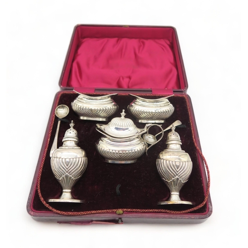 374 - An Edwardian cased silver five piece cruet set, by Joseph Gloster, Birmingham 1905-1907, the bodies ... 