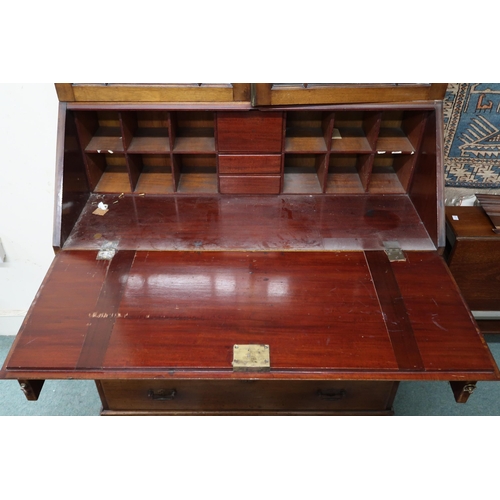 67 - An early 20th century mahogany bureau bookcase with mould cornice over pair of astragal glazed doors... 