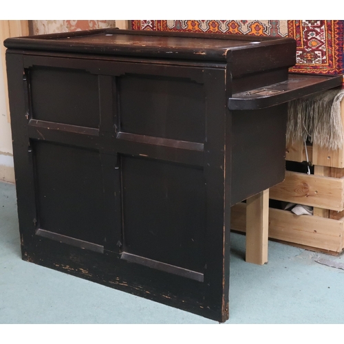 73 - An early 20th century stained pine ecclesiastical style corner table with panelled back, 83cm high x... 