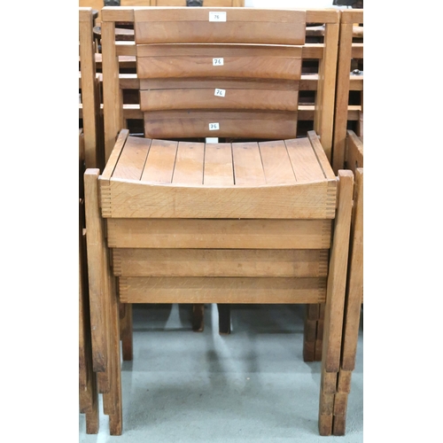 76 - A lot of four 20th century teak stacking church seats with slatted seats on square supports, some wi... 