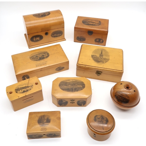 465 - A collection of Mauchline ware boxes, with views including Guthrie Castle, the Tay Bridge at Aberfel... 