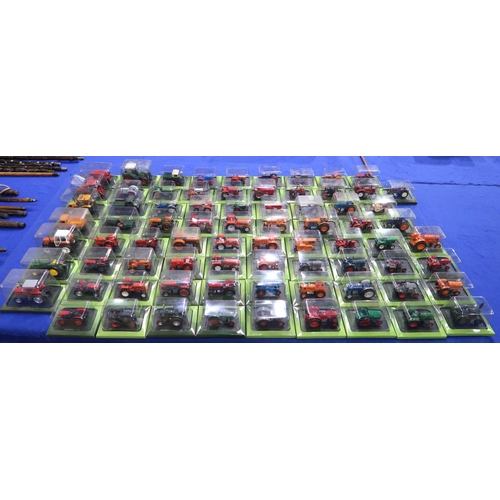 491 - A large collection of model agricultural vehicles by Hachette Partworks