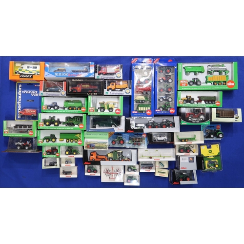 494 - Assorted model vehicles of mixed scale and manufacturer, including a large selection of agricultural... 