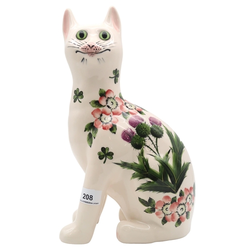 208 - A Griselda Hill Wemyss model of a cat, decorated with thistles, clover and dog roses with green glas... 