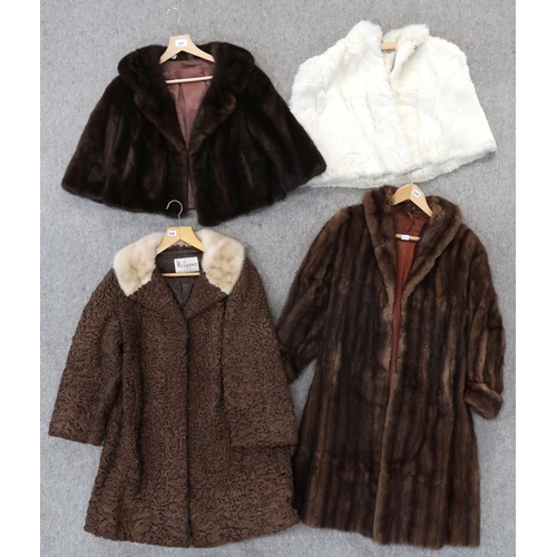 269 - A cream fur shrug, a brown fur coat and jacket and a astrakhan coat