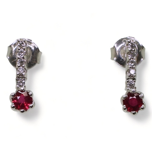 709 - A pair of 18ct white gold, ruby and diamond earrings length 1.3cm, weight 1.8gms