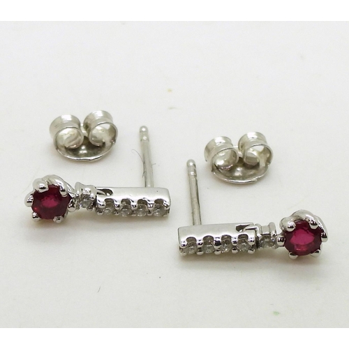 709 - A pair of 18ct white gold, ruby and diamond earrings length 1.3cm, weight 1.8gms