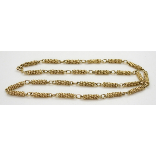 711 - A yellow metal chain with rope pattern links, length 64cm, weight 67.8gms, together with a yellow me... 