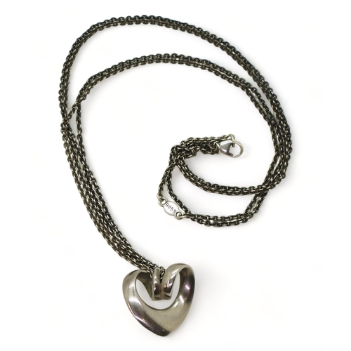 713 - A silver Georg Jensen spiral heart pendant and chain, both the pendant and chain are stamped with th... 