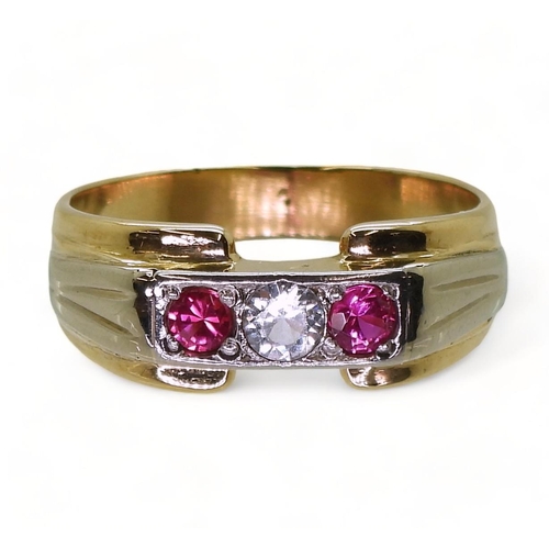 An 18k gold red and clear gem gents ring, size X1/2, weight 9.1gms