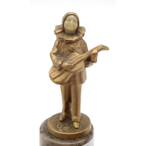 236 - A miniature Art Deco gilded metal figure of a Pierrot playing a mandolin, with faux ivory face, moun... 