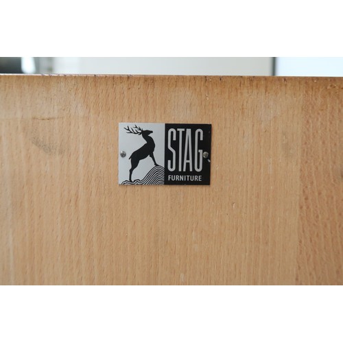 2105A - A MID 20TH CENTURY JOHN & SYLVIA REID FOR STAG S RANGE SUITE consisting a sideboard with pa... 