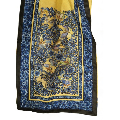 2359A - A CHINESE YELLOW GROUND PLEATED SILK SUMMER ROBEthe damask silk woven with clouds and auspicious obj... 