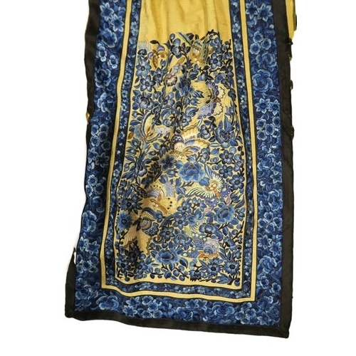 2359A - A CHINESE YELLOW GROUND PLEATED SILK SUMMER ROBEthe damask silk woven with clouds and auspicious obj... 