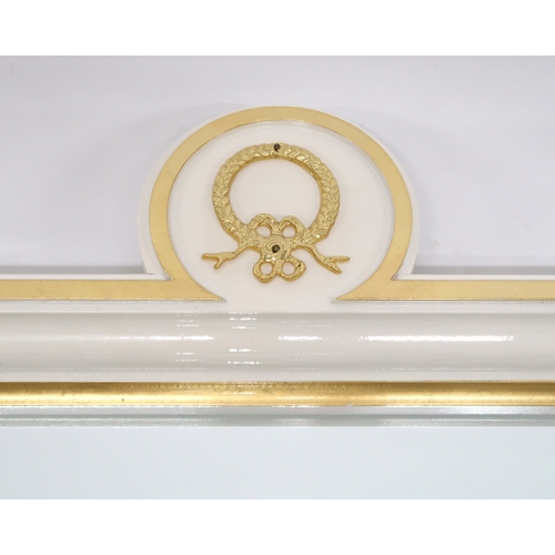 118 - A CONTEMPORARY GILT WHITE VERSACE MIRROR BACK SIDEBOARD mirror with gilt moulded cornice over rectan... 